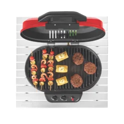 Coleman RoadTrip® 225 Portable Tabletop Propane Grill 16 Coleman RoadTrip® 225 Portable Tabletop Propane Grill -Coleman 2000033047 coleman grills 225 TT heritage red flames turned on food on grates overhead 3